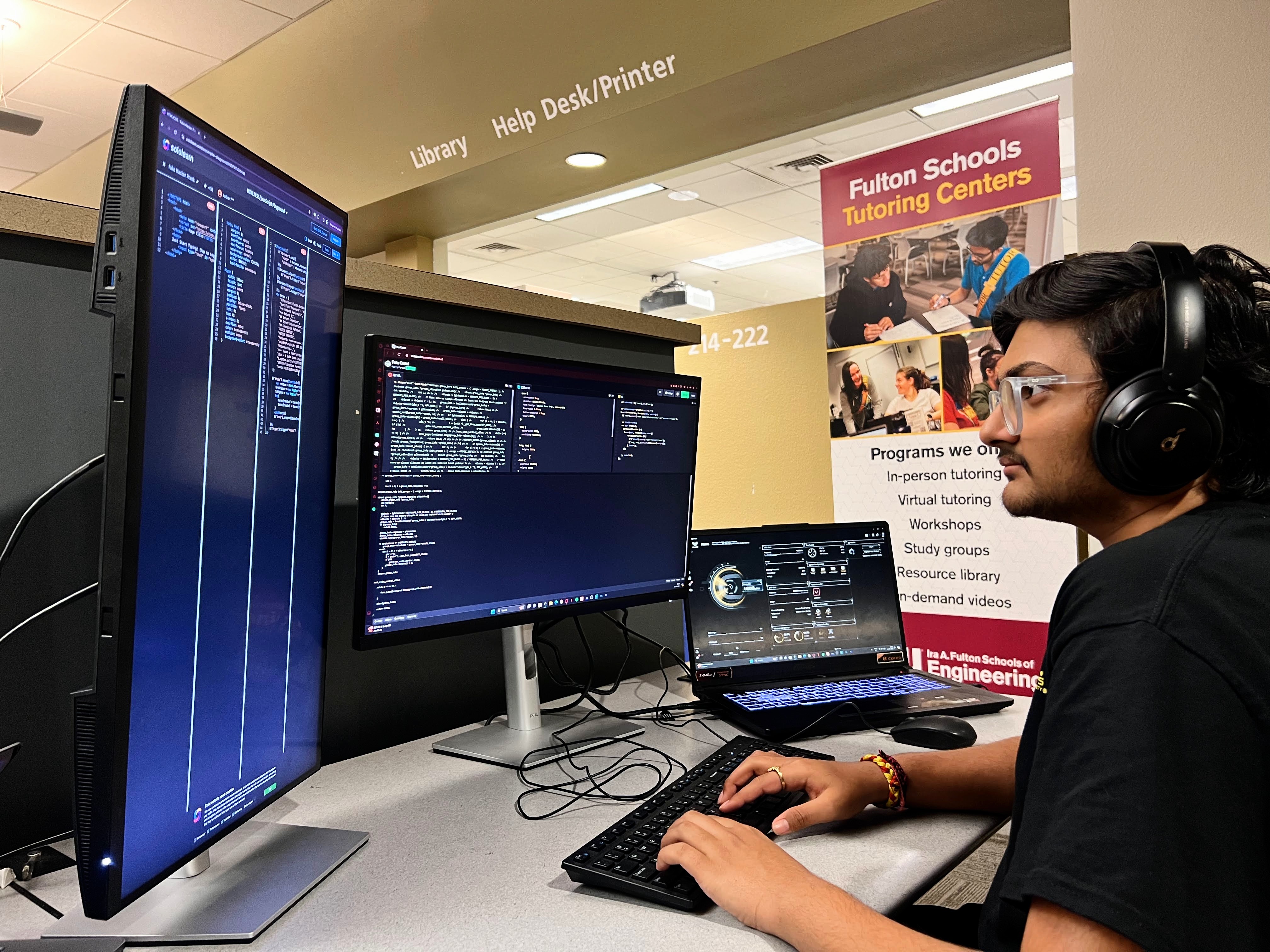 Shivraj Jadeja working at a coding workshop