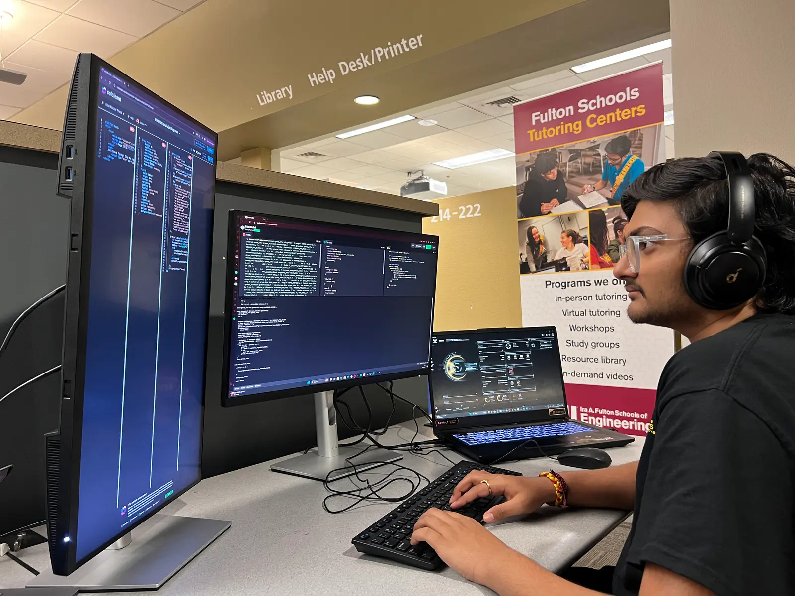 Shivraj Jadeja working at a coding workshop